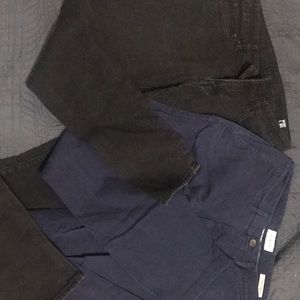 Bundle of black skinny jeans and navy blue dress pants